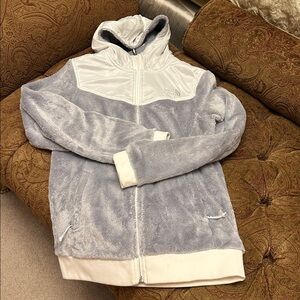 the North face grey and white jacket.